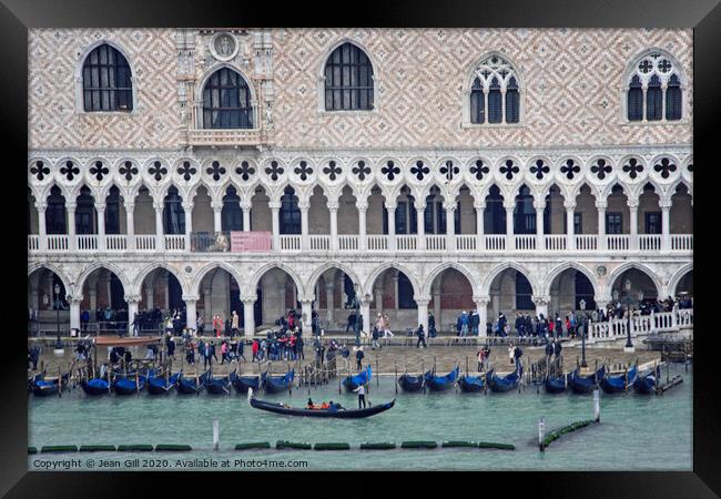 Gondolas moored by the Doge's Palace, Venice Framed Print by Jean Gill