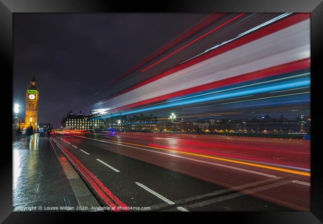 London Bus lights at night Framed Print by Louise Wilden