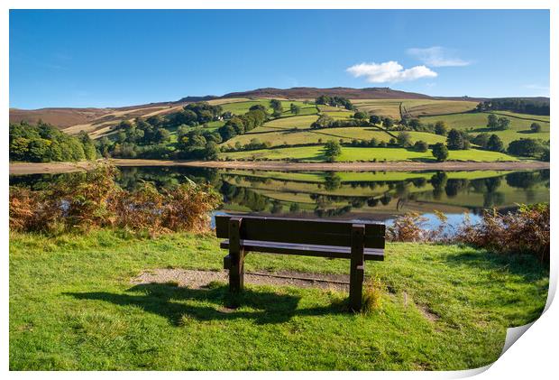 A wooden bench with views of Ladybower reservoir Print by Andrew Kearton