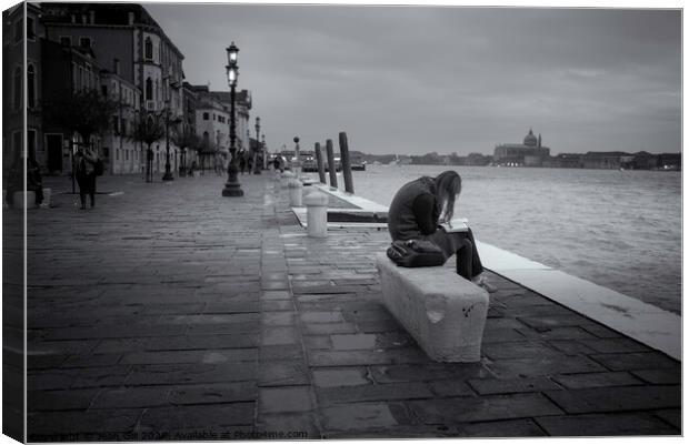 Reading Alone in Venice Canvas Print by Jean Gill