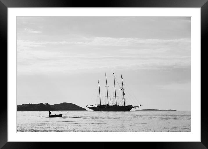 Silhouette of contrasting boats on the Peljesac Ch Framed Mounted Print by Jason Wells