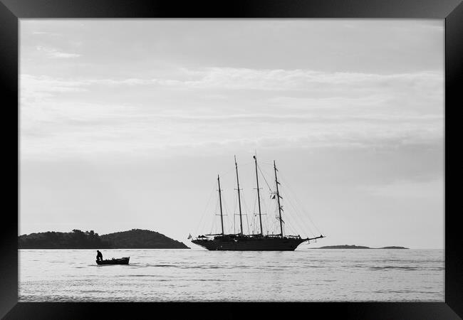 Silhouette of contrasting boats on the Peljesac Ch Framed Print by Jason Wells