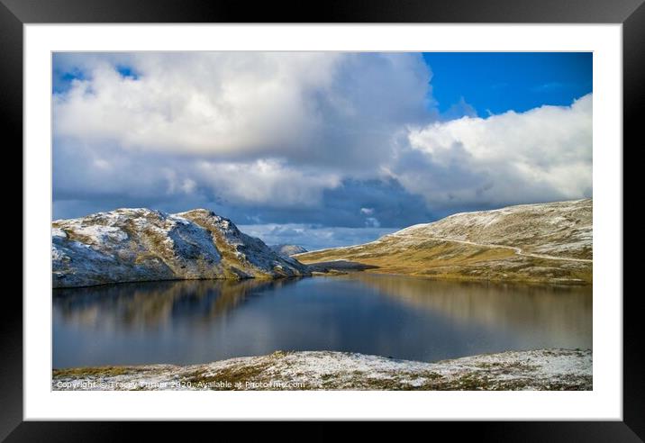 Snowy lake Framed Mounted Print by Tracey Turner