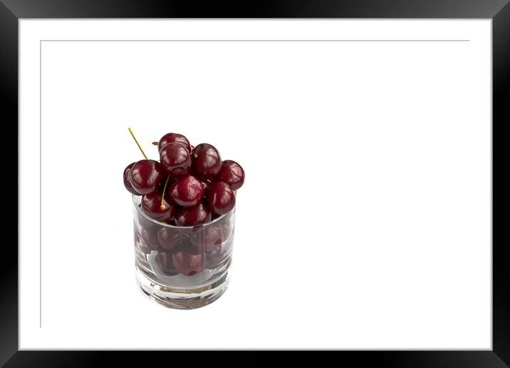 Red cherry in a transparent glass isolated on a white background Framed Mounted Print by Sergii Petruk