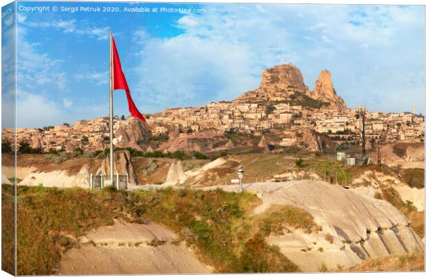 Great national flag of Turkey. Cave Uchhisar. Cappadocia, Turkey. Canvas Print by Sergii Petruk