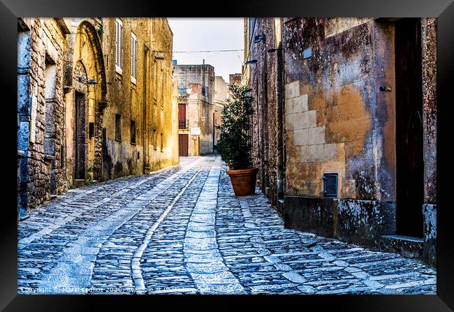 Street of the city of erice sicily Framed Print by Mario Koufios