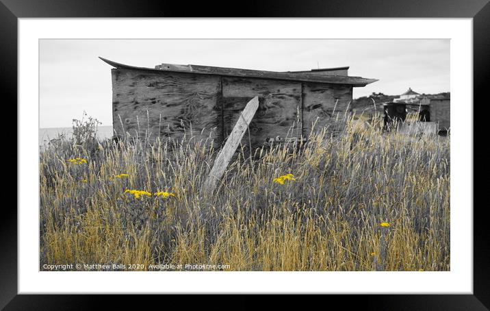An old shak overgrowen with grass and flowers Framed Mounted Print by Matthew Balls