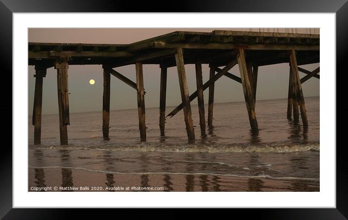 Moonrise behnd a pier Framed Mounted Print by Matthew Balls