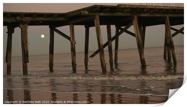 Moonrise behnd a pier Print by Matthew Balls