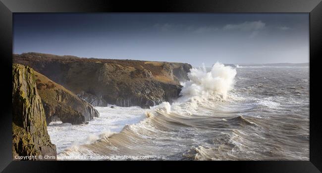 Waves crashing on the coastline in Pembrokeshire Framed Print by Chris Warren