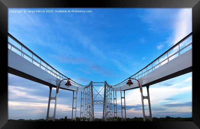 Symmetrical arches of the bridge are directed to the sky Framed Print by Sergii Petruk