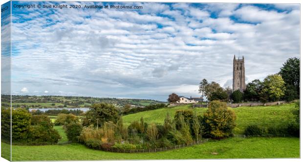 A view of the church and the lake at Blagdon Somerset Canvas Print by Sue Knight