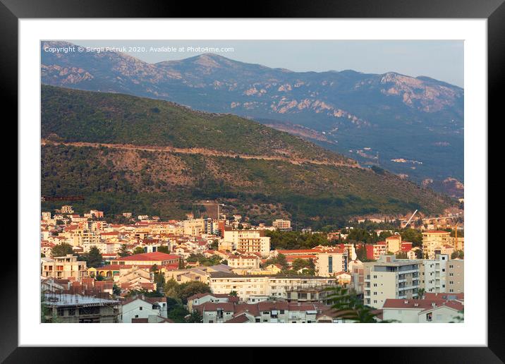 View of the modern city of Budva Riviera on the background of a sea bay and a mountain chain Framed Mounted Print by Sergii Petruk