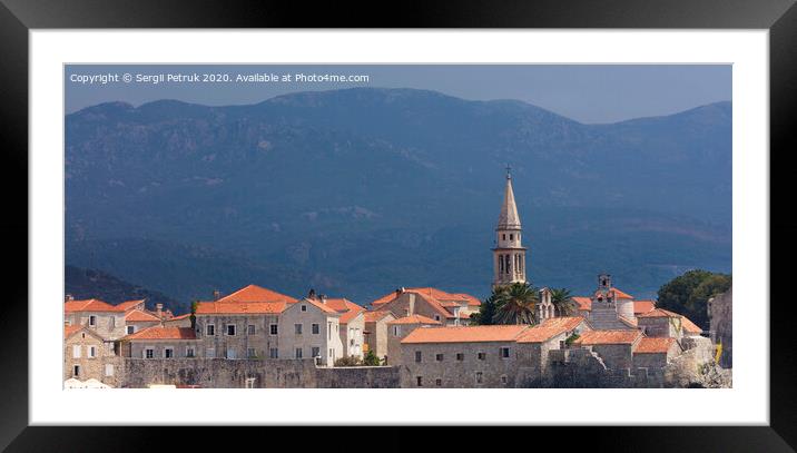 View of the old town of Budva in Montenegro against the background of blue-green mountains Framed Mounted Print by Sergii Petruk