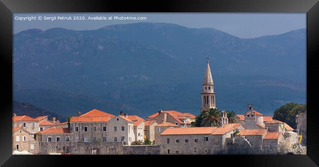 View of the old town of Budva in Montenegro against the background of blue-green mountains Framed Print by Sergii Petruk