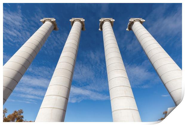 Four massive columns, blue sky in Barcelona of Spain Print by Arpad Radoczy
