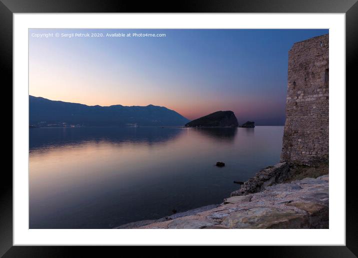 A large body of water with a mountain in the background Framed Mounted Print by Sergii Petruk