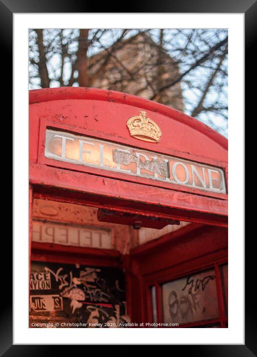 Red telephone box Framed Mounted Print by Christopher Keeley