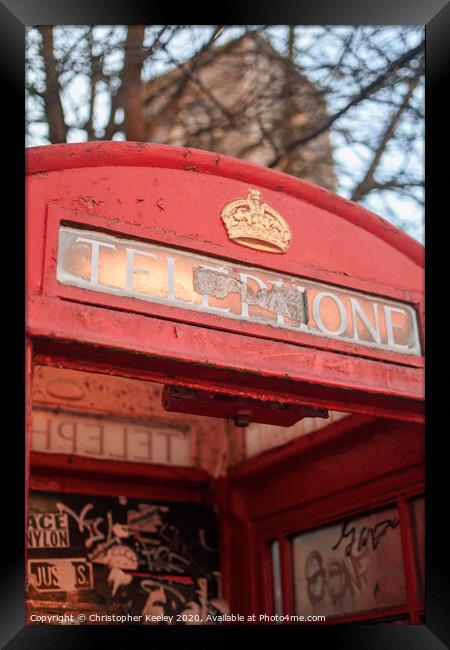 Red telephone box Framed Print by Christopher Keeley