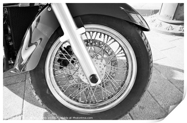 A motorcycle parked on the side of a road Print by M. J. Photography