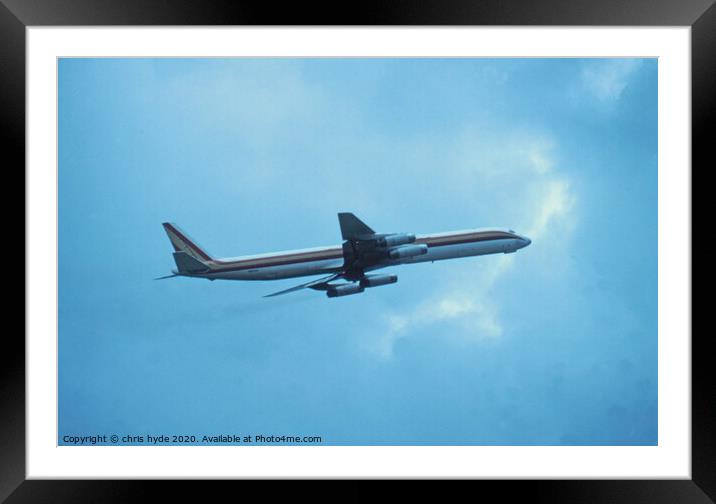 DC8 Climbing in to Storm Framed Mounted Print by chris hyde