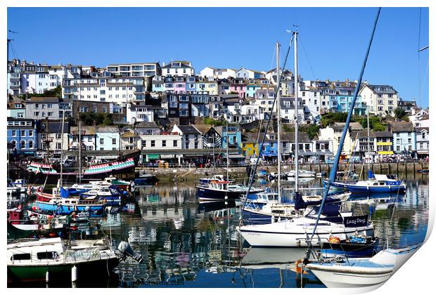 The inner harbour with reflections at Brixham in Devon. Print by john hill