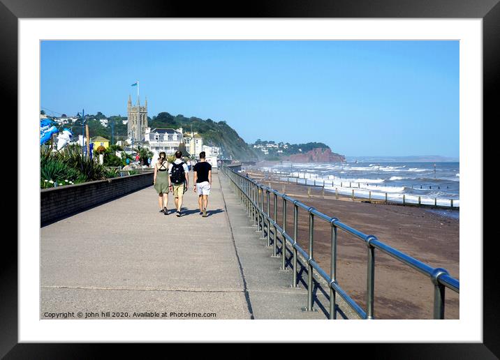 Walking the promenade at Teignmouth Devon. Framed Mounted Print by john hill