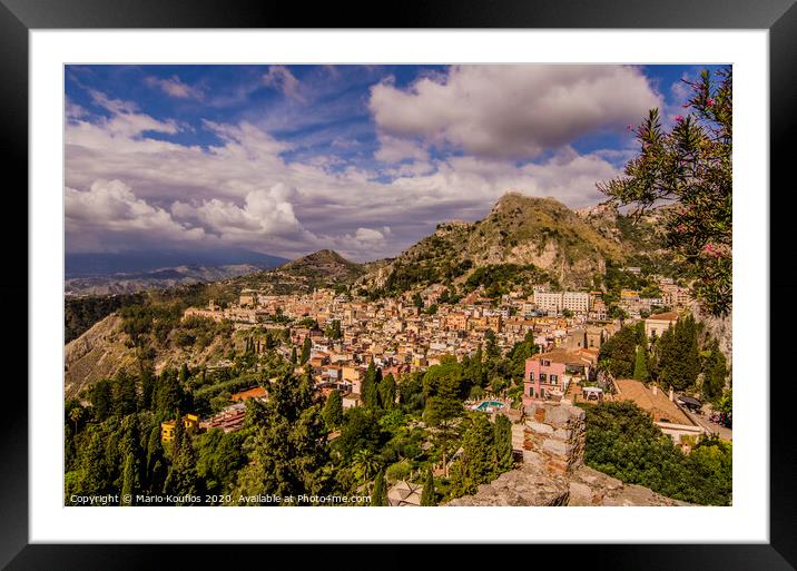 Panoramic view of the city of Taormina from its ancient Greek theater Framed Mounted Print by Mario Koufios