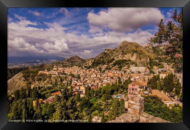 Panoramic view of the city of Taormina from its ancient Greek theater Framed Print by Mario Koufios