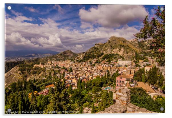Panoramic view of the city of Taormina from its ancient Greek theater Acrylic by Mario Koufios