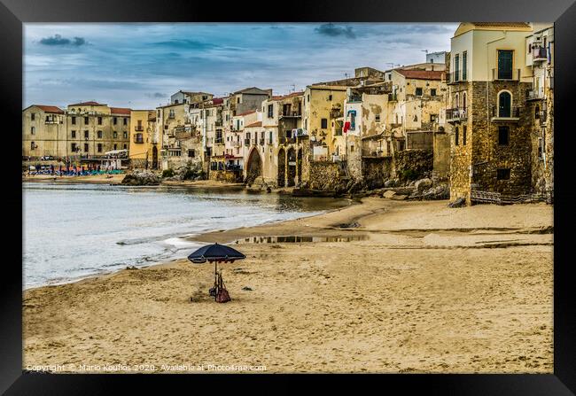Beach with umbrella in the city of cefalu Framed Print by Mario Koufios