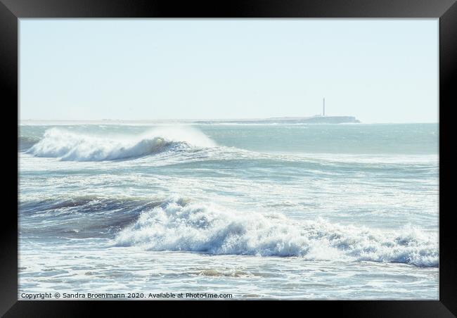 Big waves and a lighthouse Framed Print by Sandra Broenimann