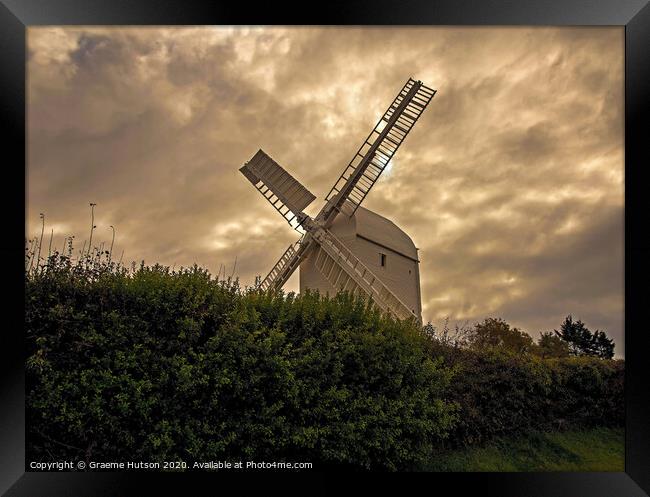 Windmill and stormy sky Framed Print by Graeme Hutson