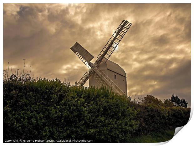 Windmill and stormy sky Print by Graeme Hutson