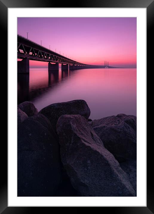 Oresunds Bridge and Rocky Shore at Sunset Framed Mounted Print by Antony McAulay