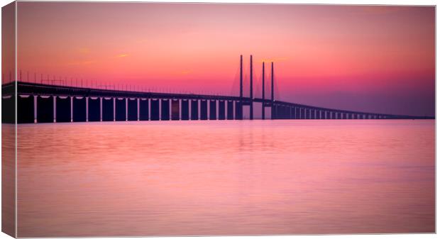Oresunds Bridge at a Tranquil Sunset Canvas Print by Antony McAulay