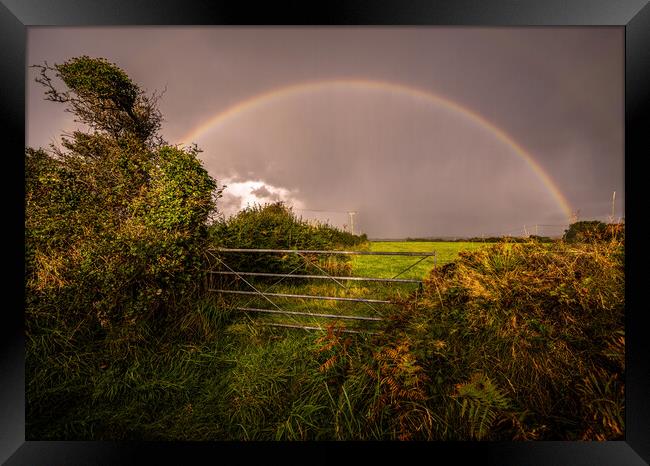 stormy rainbow Framed Print by Jason Thompson