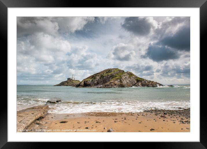 Mumbles lighthouse and small wave Framed Mounted Print by Bryn Morgan
