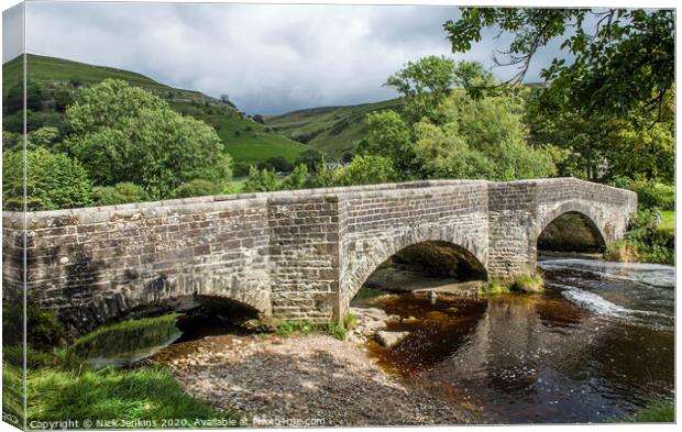Bridge over the River Wharfe Buckden Yorkshire Dal Canvas Print by Nick Jenkins