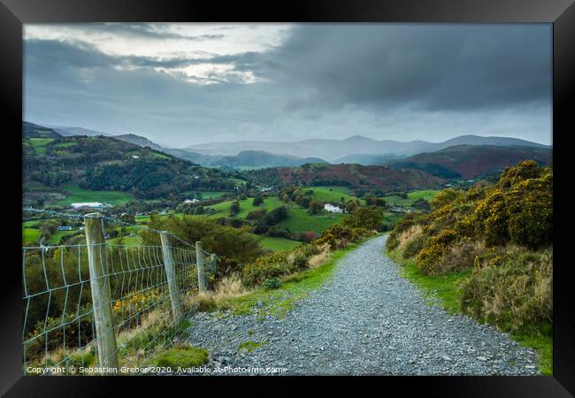 Llangollen hillside from Dinas Bran Framed Print by Sebastien Greber