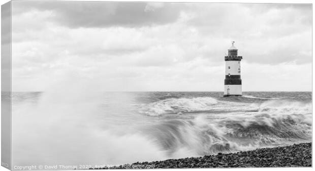 The Mighty Penmon Lighthouse Canvas Print by David Thomas