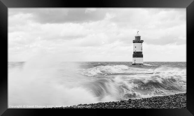 The Mighty Penmon Lighthouse Framed Print by David Thomas