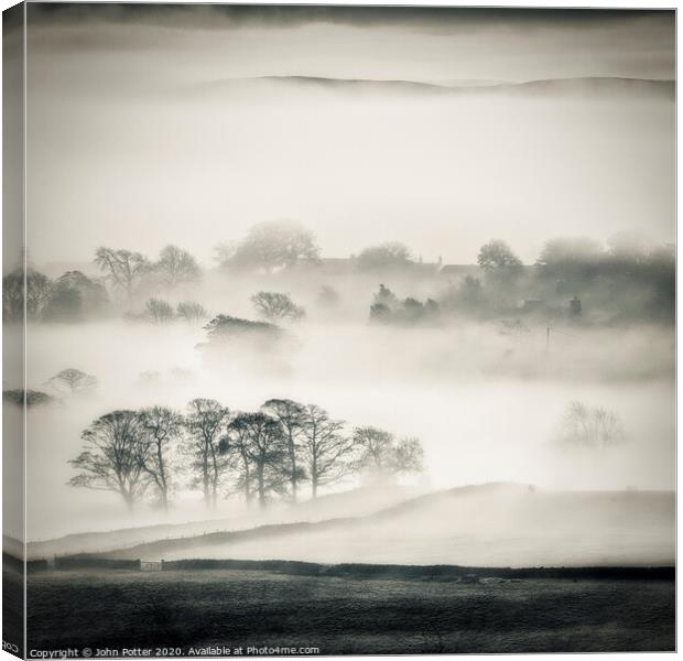 Misty Daybreak, Wharfedale, The Yorkshire dales. Canvas Print by John Potter