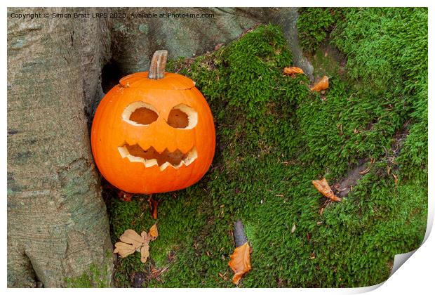 Scary halloween pumpkin in the woods Print by Simon Bratt LRPS