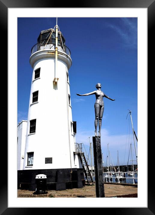 Harbour lighthouse and bathing belle statue at Scarborough. Framed Mounted Print by john hill