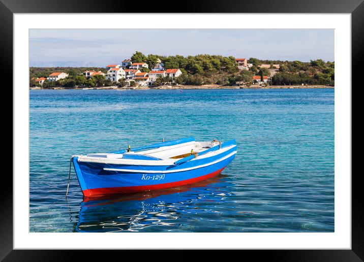 Pretty fishing boat moored in Korcula Framed Mounted Print by Jason Wells
