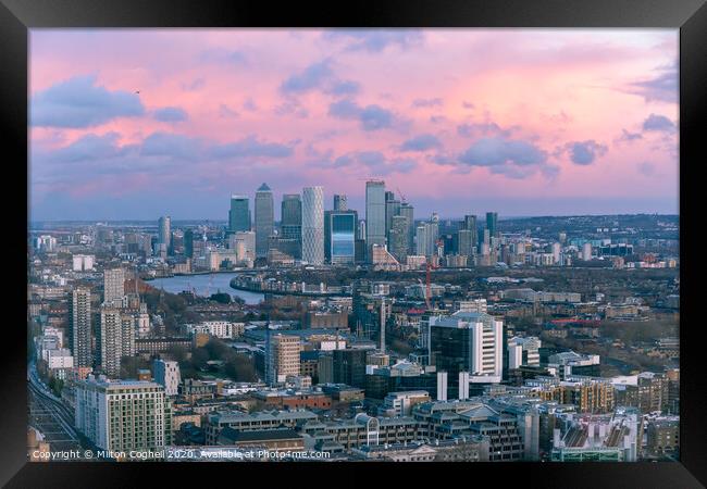 Aerial sunset London cityscape with Canary Wharf in the background Framed Print by Milton Cogheil