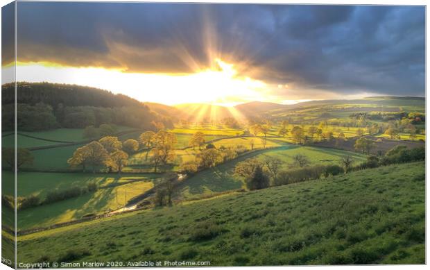 Breathtaking sunset over Clun Valley Canvas Print by Simon Marlow