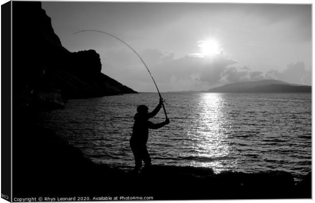 Young man fishing with feathers for mackerel B+W Canvas Print by Rhys Leonard