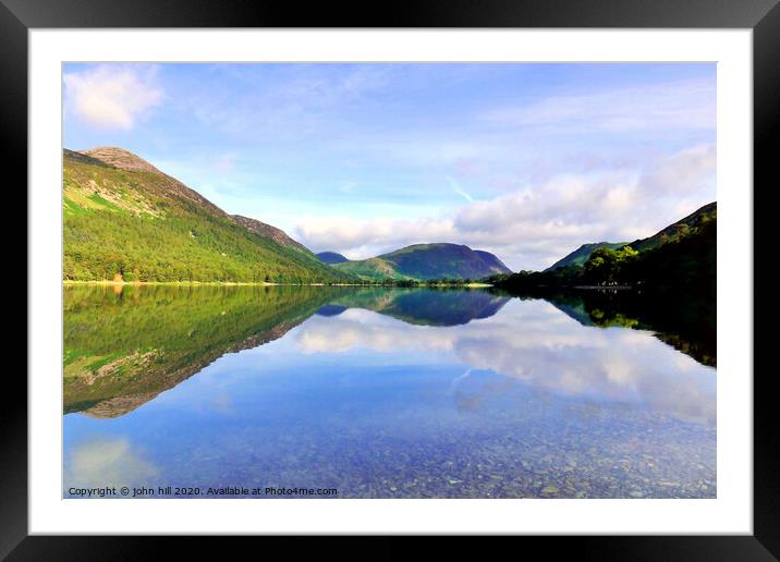 Reflections in Buttermere lake with Mellbreak mountain in Cumbria.  Framed Mounted Print by john hill